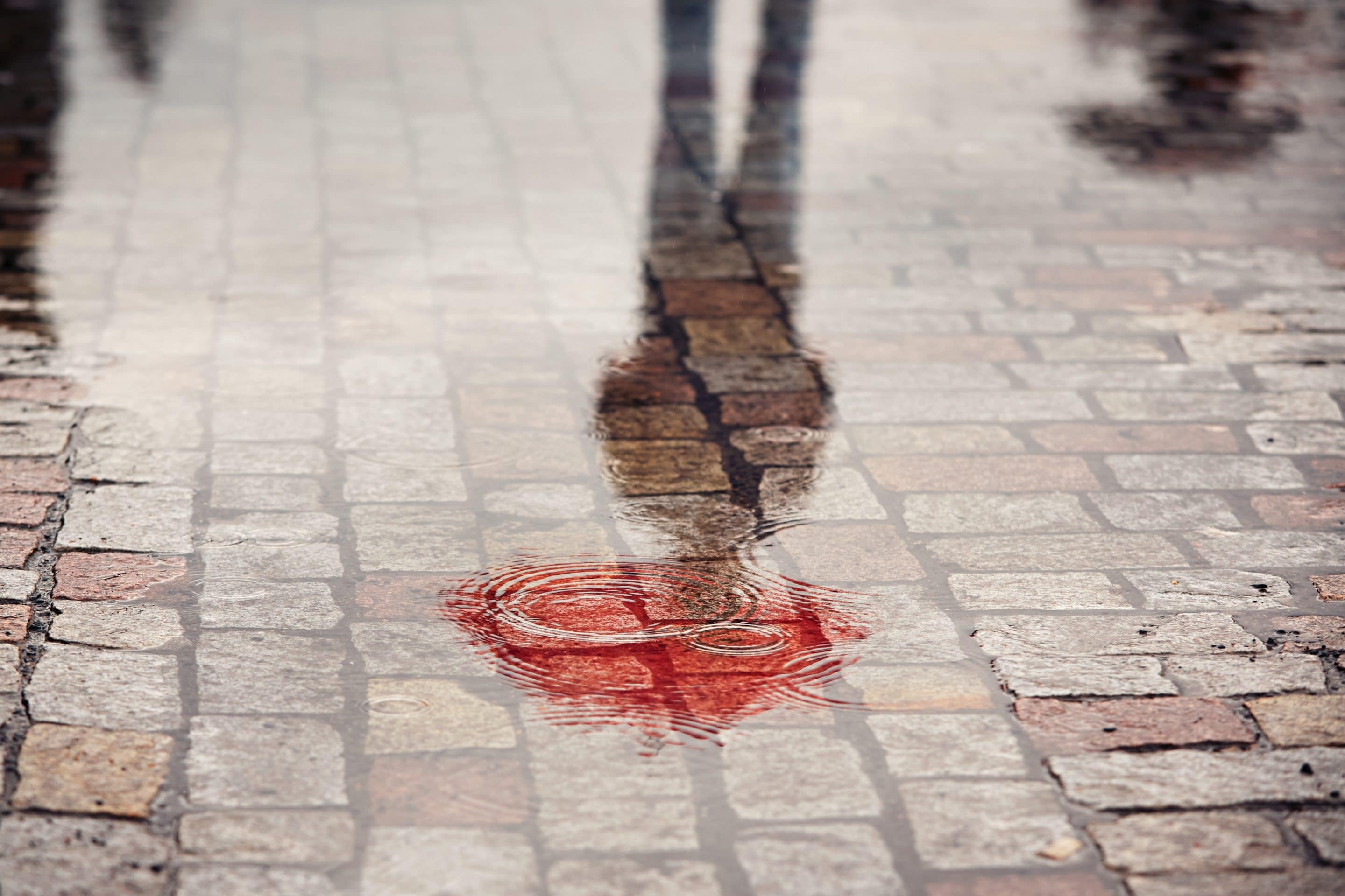 Man in rainy day